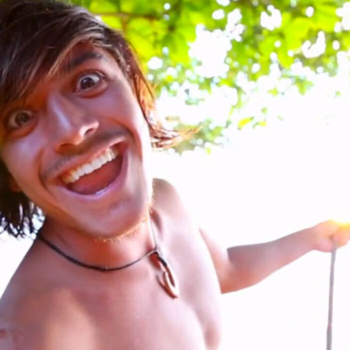 You'd be happy too, if you had that rope swing in your front yard.