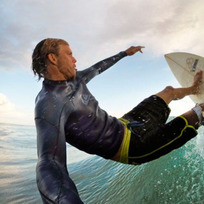 Top turn shot with the Hero 3+. This Merrick is a magic board given to me by Bethany Hamilton. GoPro made me this neat surf handle that works well. A bit akward to paddle with it in your mouth though as it feels like I am getting waterboarded. Photo: Mike Coots