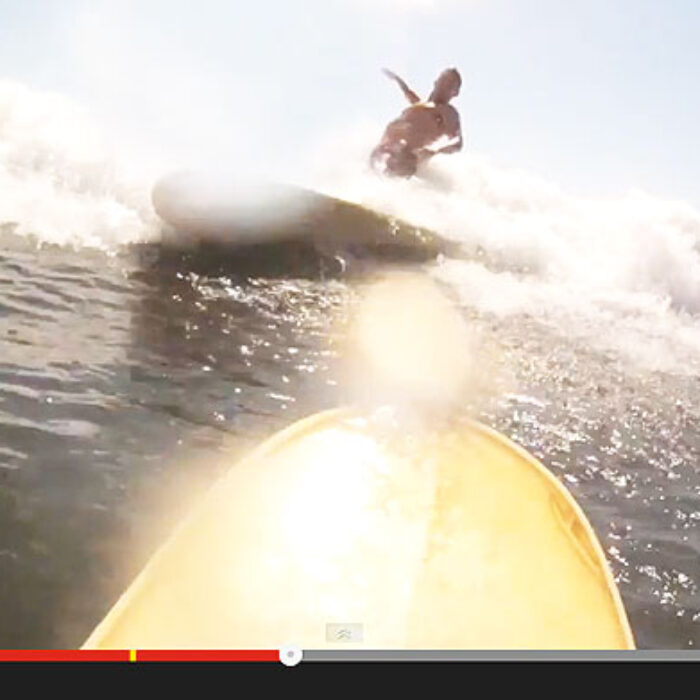 This is not what you want to see when you're paddling out. But if you do, there are about a million ways to avoid it, none of which this guy does. "It's on film, he tried to kill me!"