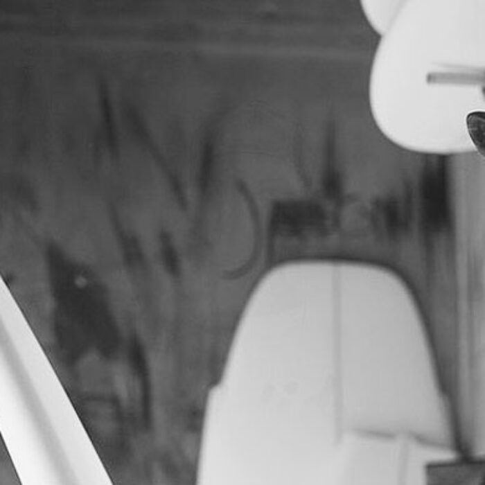 Dan O'Hara, eyeing his craft. Photo: Mary-Ellen Kennedy/Solid Surfboards