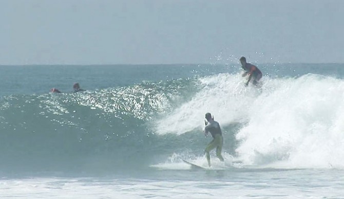 There's an upside to getting dropped in on by the number one ranked surfer in the world.