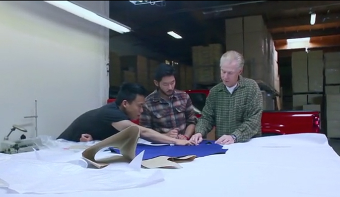 Alex (L) and Andrew (R) roll up their sleeves and get to work with Mark Malinski. Photo c/o Carapace Wetsuits