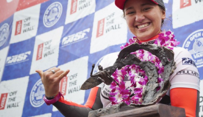 Carissa Moore collects a work of art at the U.S Open of Surfing.
