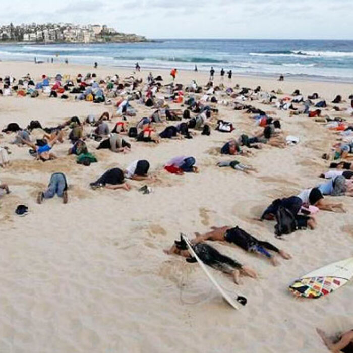 Many believe that Tony Abbott has his head in the sand when it comes to climate change. Photo: Mic.com
