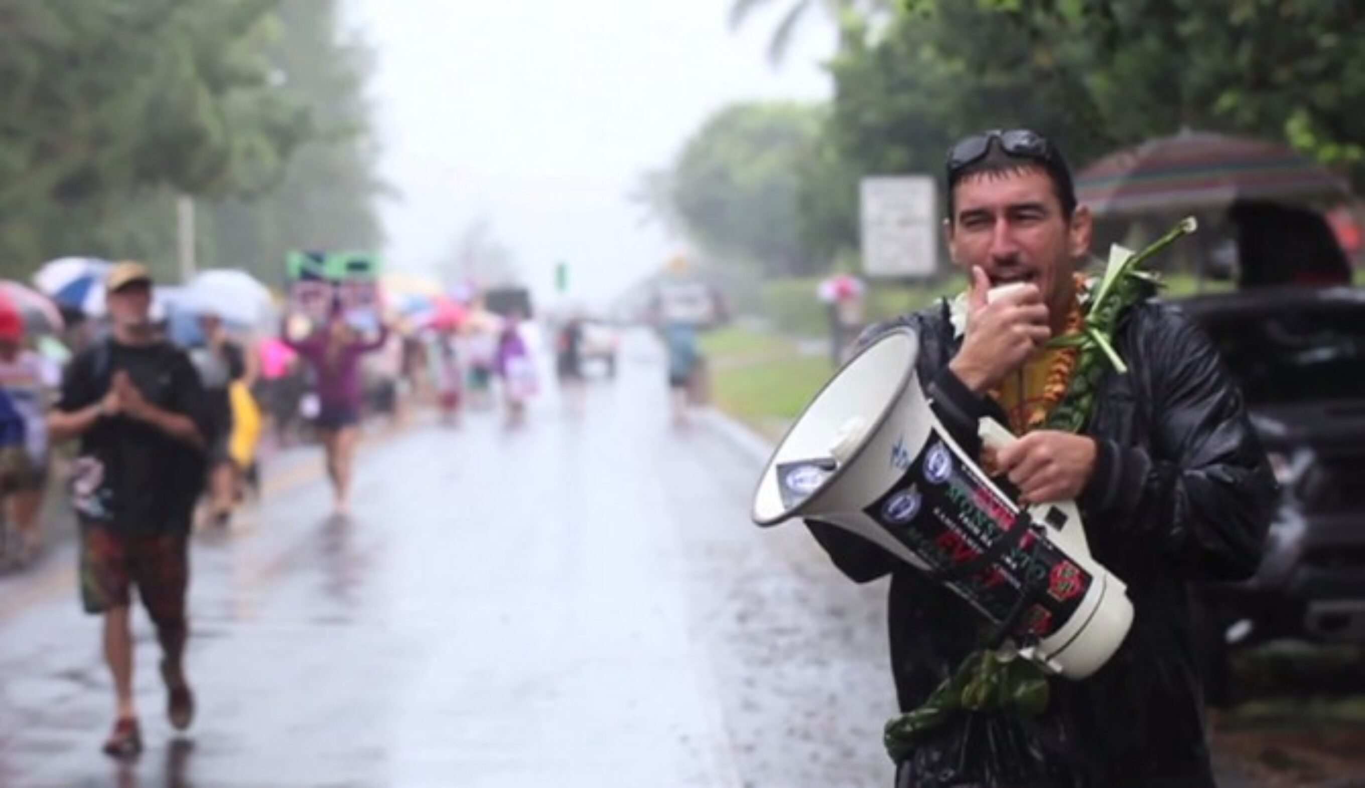 Leading an anti-GMO demonstration on the North Shore of Hawaii. Dustin Barca’s is not only fighting for Kauai, but all of the islands. Photo: Courtesy of Change for Balance Productions