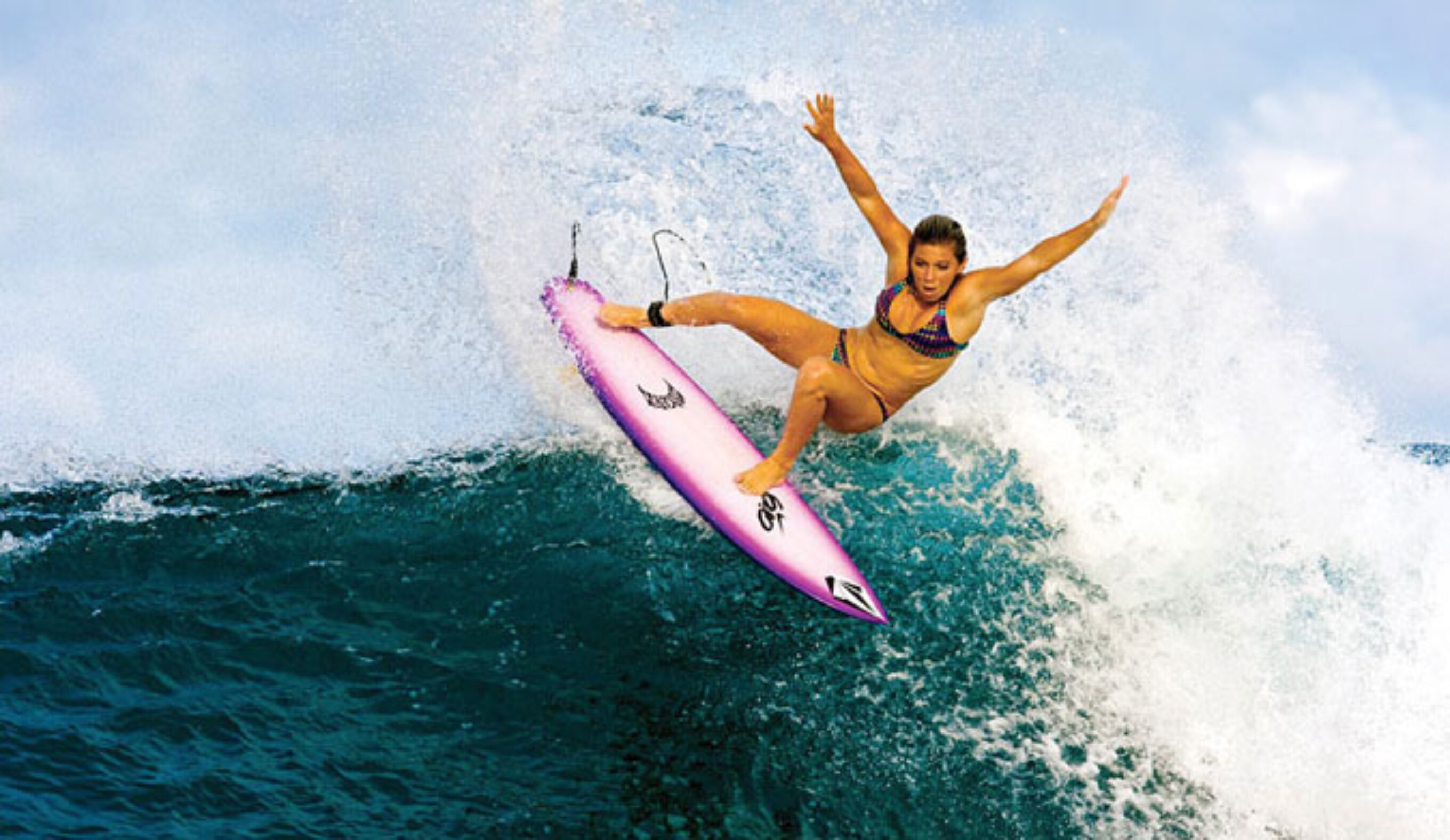 Coco Ho surfs like a girl. And that's a good thing. Photo: Nike 6.0