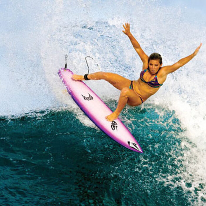 Coco Ho surfs like a girl. And that's a good thing. Photo: Nike 6.0