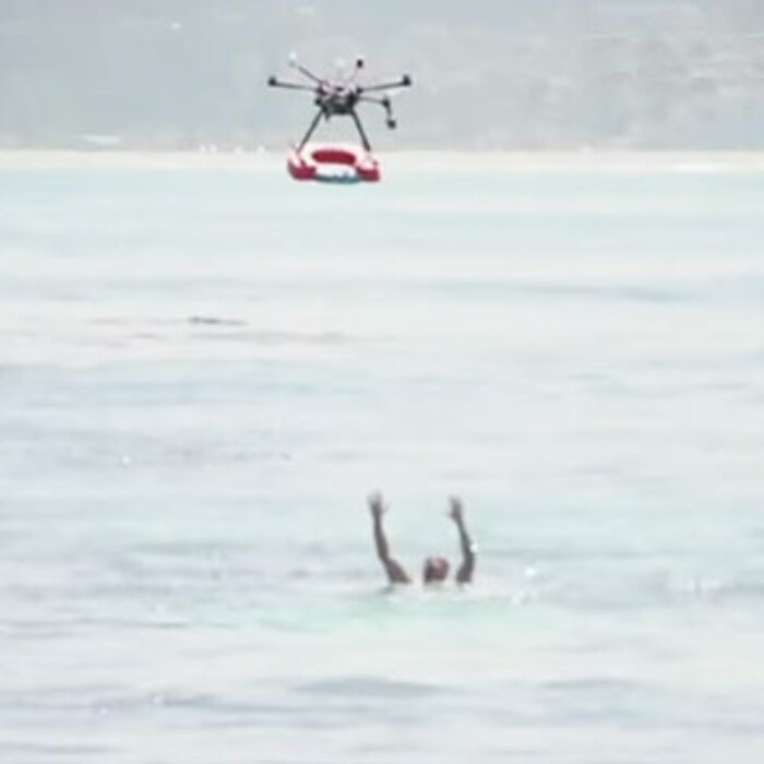 The drones are fitted with a float, camera, microphones, and a speaker, so that a lifeguard can drop the float, see what happens, and yell at the swimmer to hold on to it from the beach, instead of right in their face.