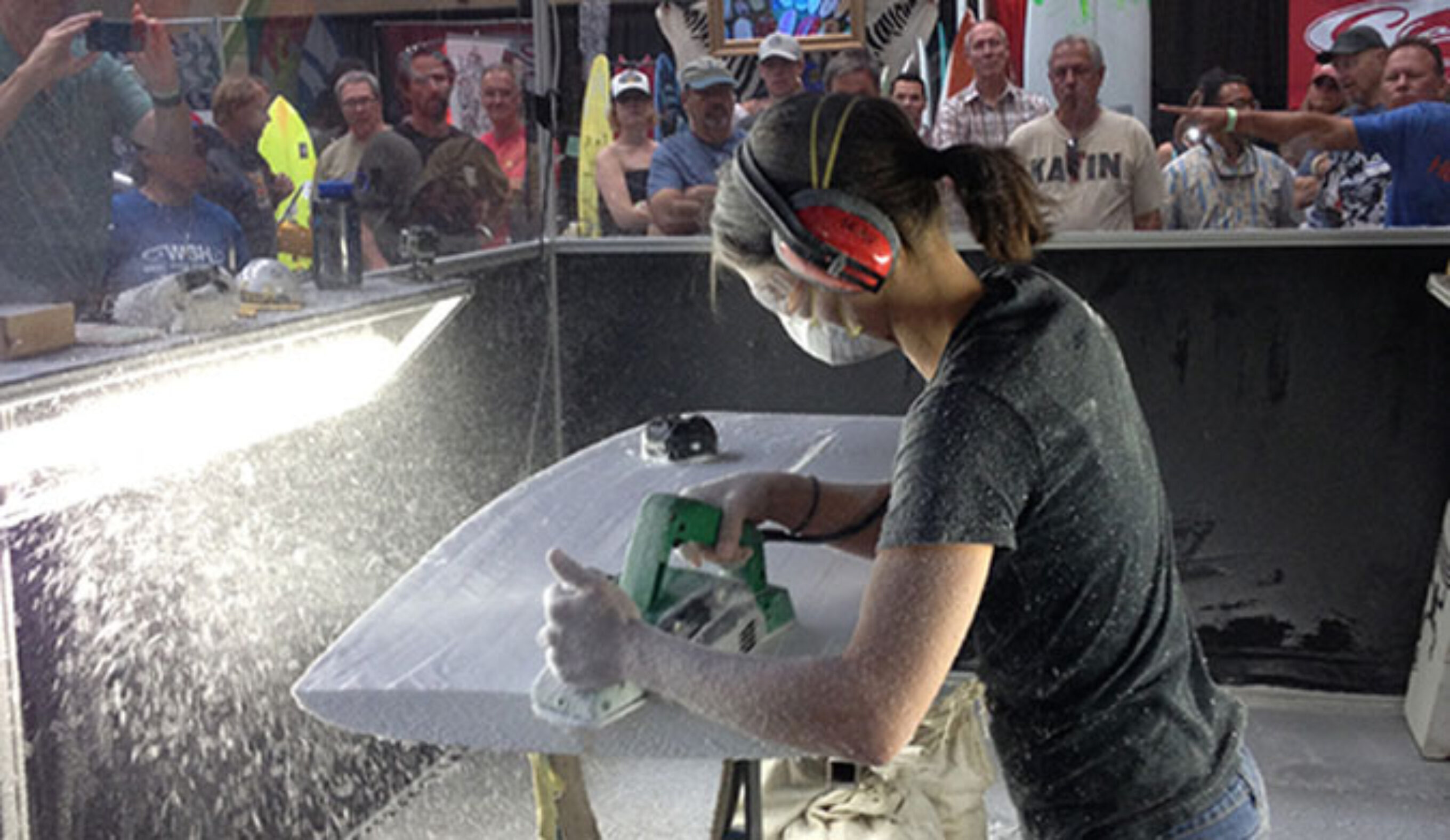 Craftswoman Kelly Connolly mowing foam at The Boardroom.