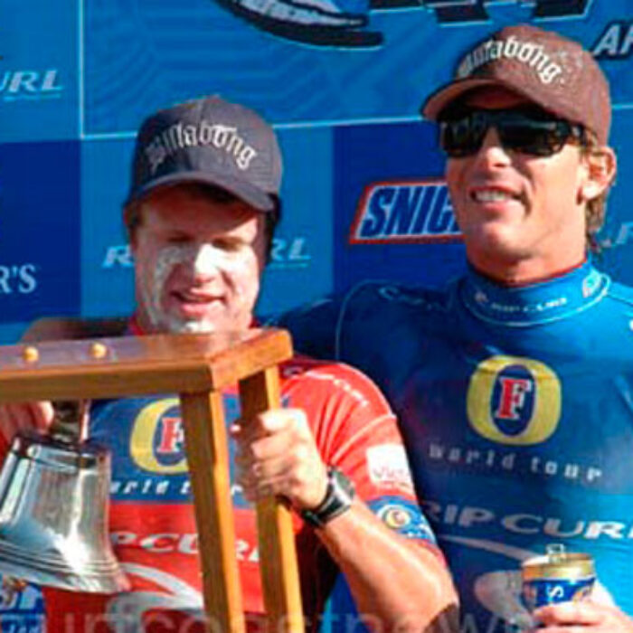 Andy Irons vsThe elated Taj Burrow and runner-up, Andy Irons, celebrating a hard-earned spot on the winner's podium at the 2007 Rip Curl Pro Bells Beach. Photo: WSL. Taj Burrow, Bells Beach Final 2007