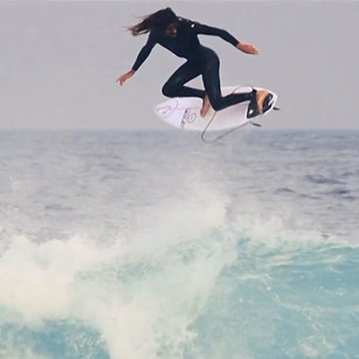 Waves, babes, funky fashion, airs, barrels of the chunky and fast kind and barrels of the groovy covered up hot dogging on some retro boards.