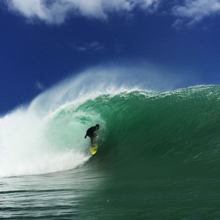 Never before have I got on a plane to chase a swell with nothing but my phone.