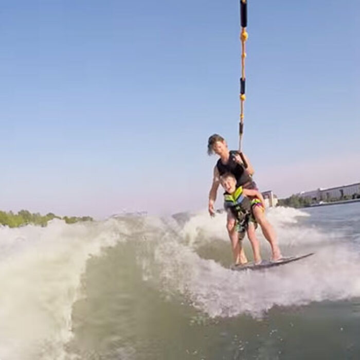 Father and son wakesurf