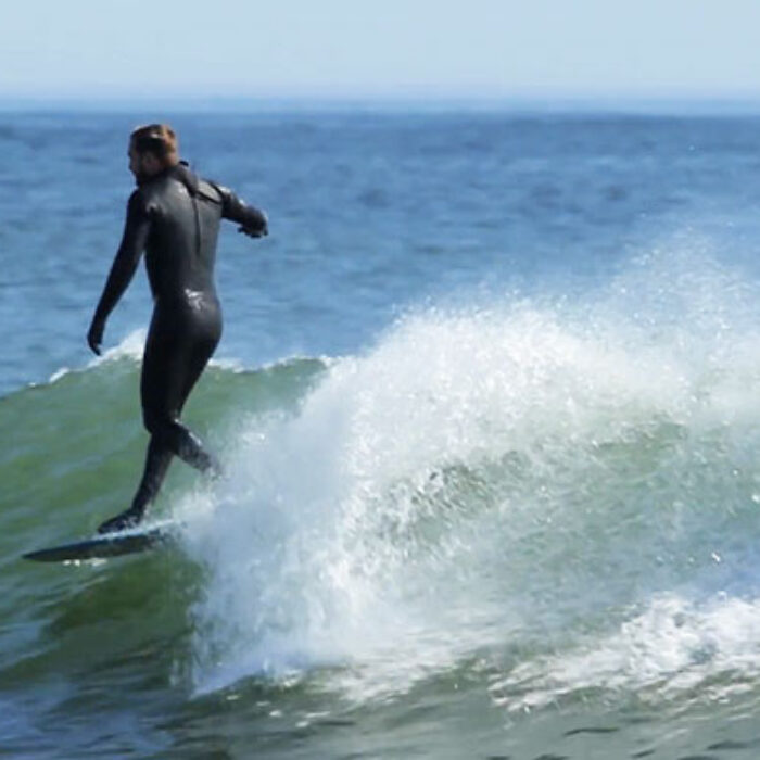 After doctors told him he would never be able to surf again, he simply started surfing again.