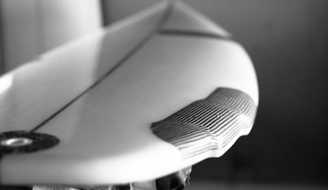 Rails and tails combining with a double wing on Chemistry Surfboard’s Wide J 6 model.