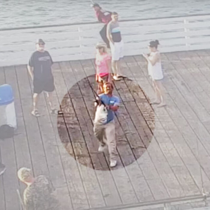 This fisherman on the San Diego pier didn't take kindly to the intrusion on the sanctity of his fishing time.