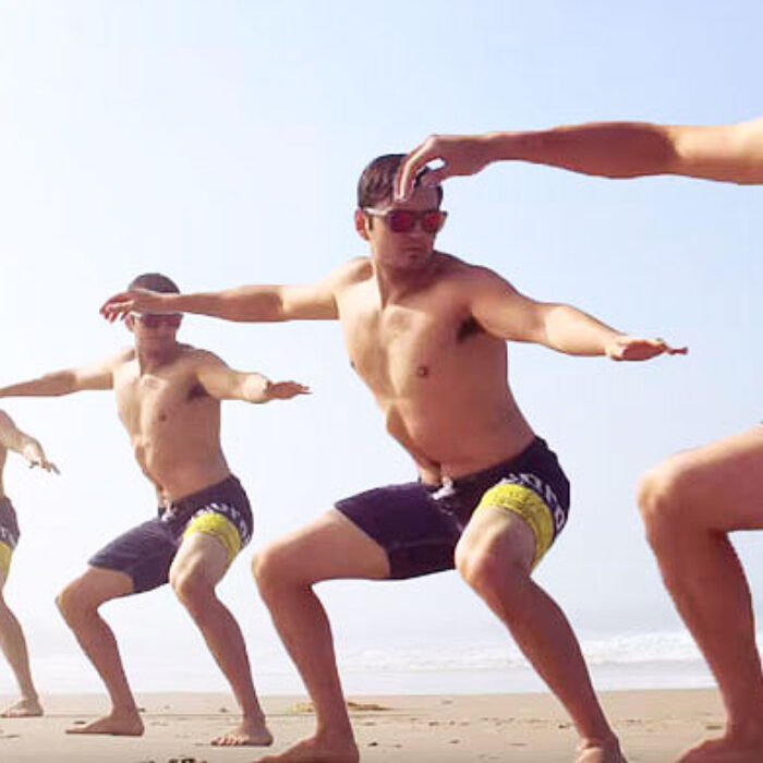 He's just standing on the beach in a stink bug pose.