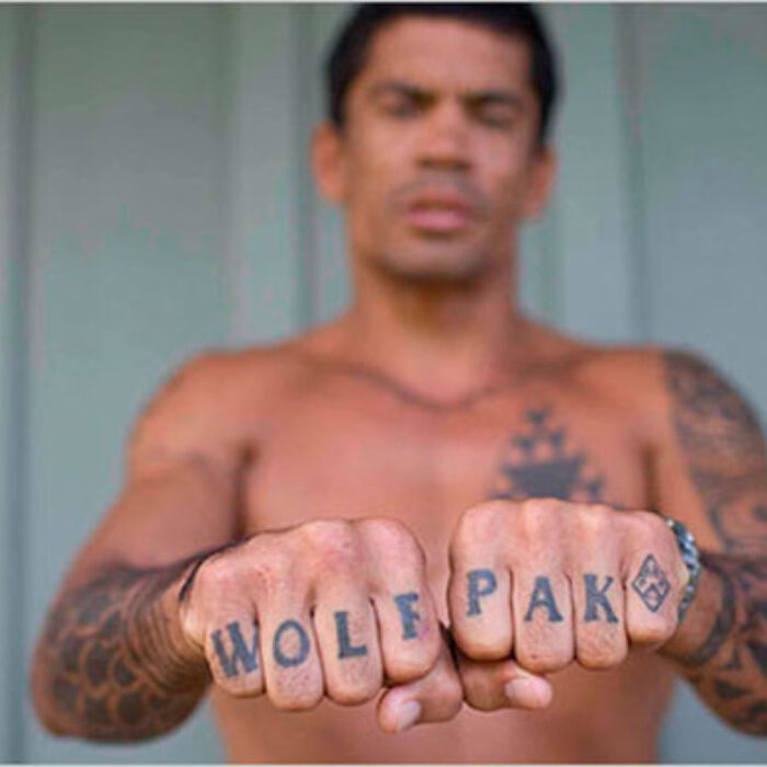 Kala's 'WOLF PAK' tattoo and his fists are processed by separate sets of brain regions depending on if you focus on the letters or his fingers.