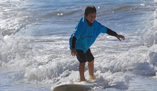 Many of these kids came from gritty urban neighborhoods-thus the name–and would otherwise have zero chance of ever getting near a surfboard or learning how to swim. Many have never even been to the beach. Photo: Urban Surf 4Kids