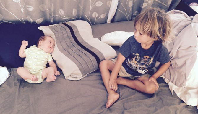 Kai, this is your baby sister. You're going to have to share waves with her one day.