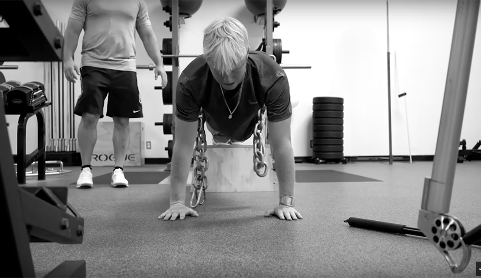Nat Young building both physical and mental strength in the gym.