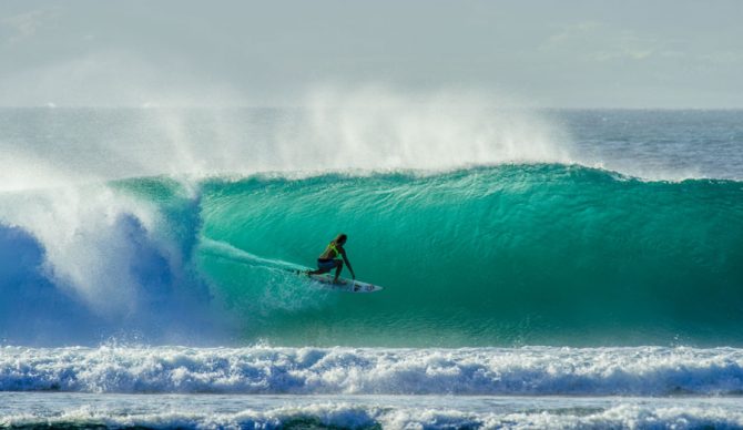It's tough to imagine surfing massive Cloudbreak with two arms, let alone one. Photo: Aaron Lieber