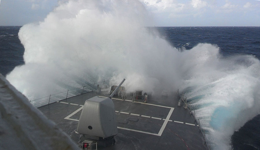 The guided missile destroyer USS Barry deploys to sea from Naval Station Norfolk ahead of Hurricane Sandy in 2012. U.S. Navy/Flickr