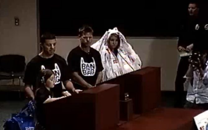 Zoe Florence (left), Aimee Borgmeyer (right), and two representatives from Surfrider's local chapter speak at an HB city council meeting in August, 2011. Photo: HBTV