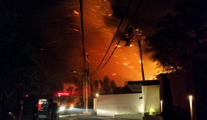 A fire, allegedly caused by fireworks, erupted Wednesday night at the Uluwatu Surf Villas in Bali, burning down two structures. The suspects are five California tourists that fled the scene in the chaos of the fire. Photo: Facebook/ Lightning Venus