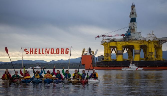 Activists from the sHELLNO campaign protest Shell and drilling in the Arctic in Port Angeles, Washington. President Obama announced in late December a move to protect large swaths of the Arctic and the Atlantic seaboard from offshore drilling. Photo: Flickr/Backbone Campaign