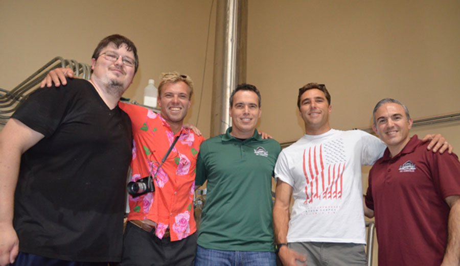 Happy because there's beer involved. Photo: Surfers Village