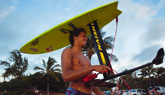 Kai Lenny with his hydrofoil surfboard. Photo: Casey Acaster