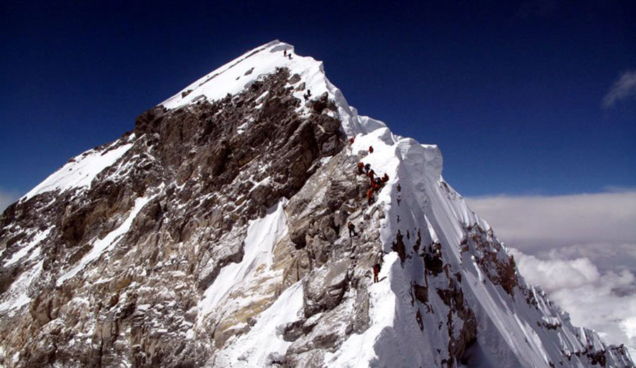 The Hillary Step is the black rock section on the ridge just below the final summit snow slope Photo: Anselm Murphy.