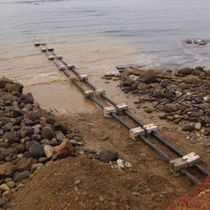 SENFU Mexico, a seafood exporter, installed two pipelines into the break at Tres Emes, part of the Bahia de Todos Santos World Surfing Reserve.