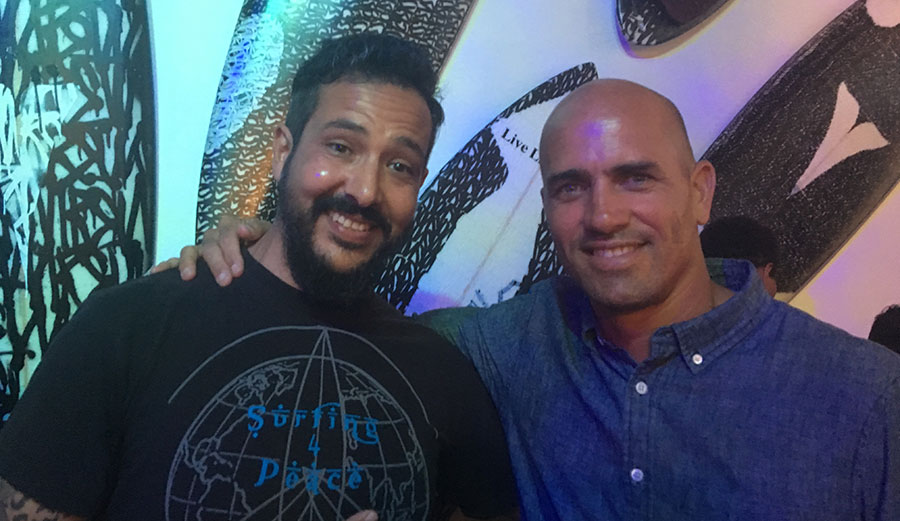Joshua and Kelly Slater at an event for Surfing 4 Peace, a person-to-person and cross-border cooperation initiative that aims to bridge cultural and political barriers between surfers in diverse communities in the Middle East and around the world.