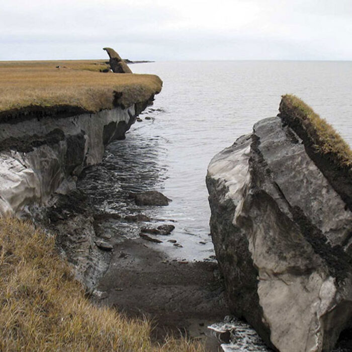 Collapsed block of ice-rich permafrost along Drew Point, Alaska, at the edge of the Beaufort Sea. Coastal bluffs in this region can erode 20 meters a year (around 65 feet).