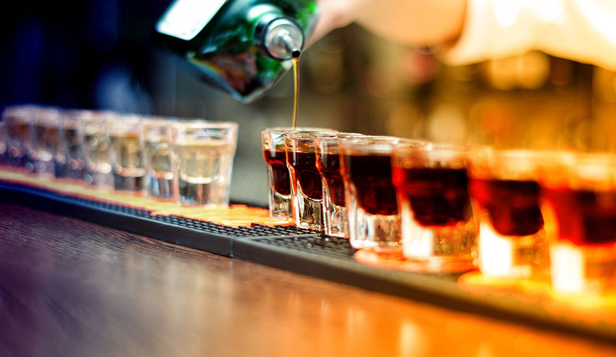 bartender pouring shots