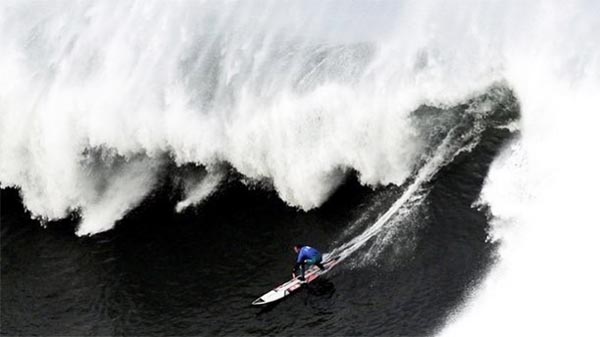 Big Wave surfer Andrew Cotton tore his ACL at a big wave contest in Chile, his second major injury in as many years.