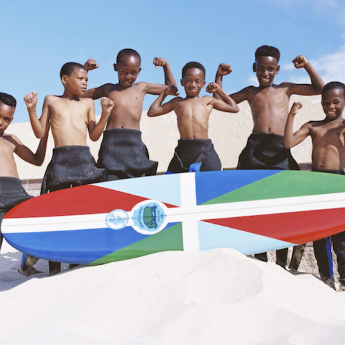 The kids of Harper, Liberia may be new to surfing but it's giving them a new lease on life. Photo: Mami Wata