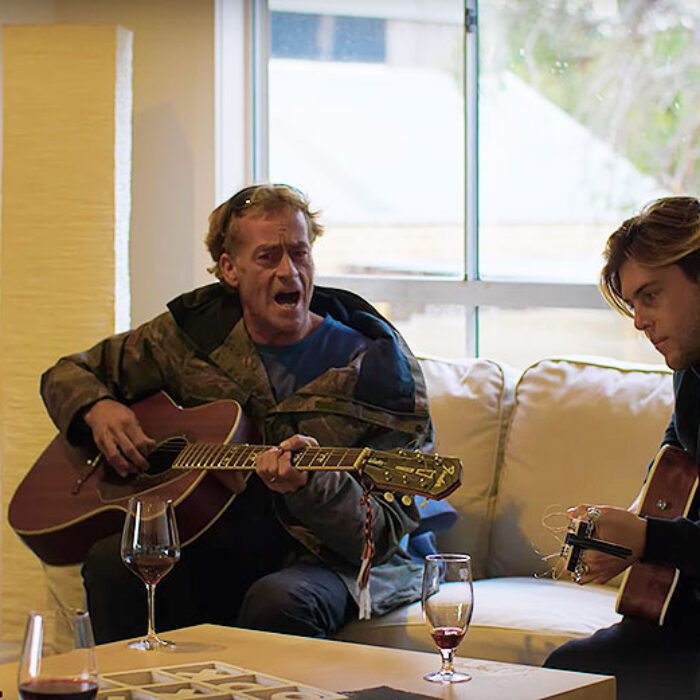 Tom Curren and Conner Coffin playing music at Bells Beach