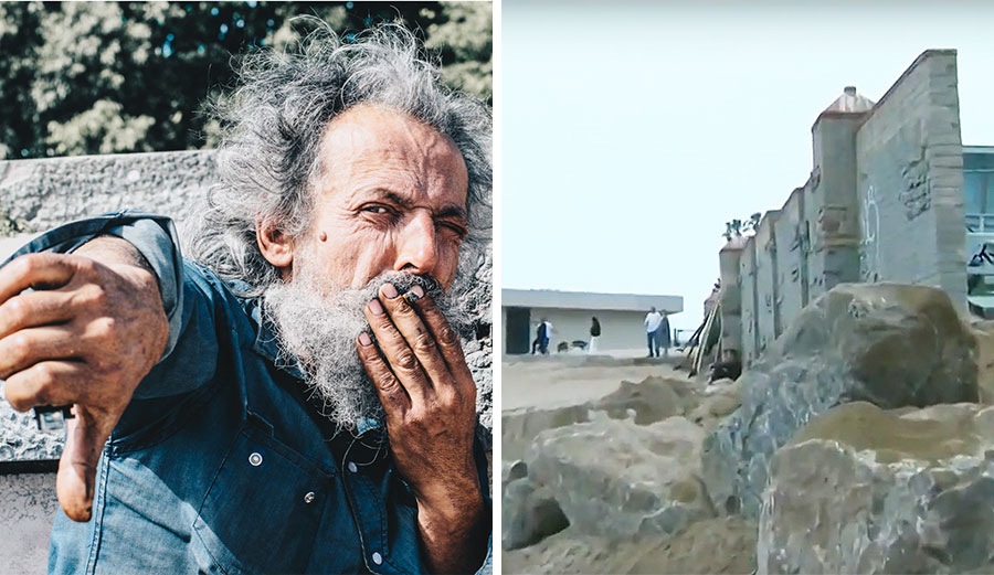 Man in front of Malibu wall
