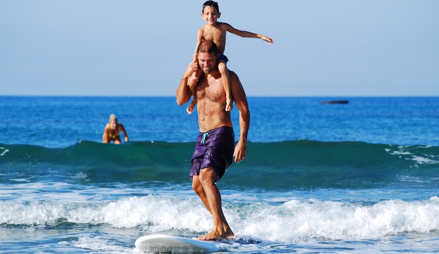 Father son surfing