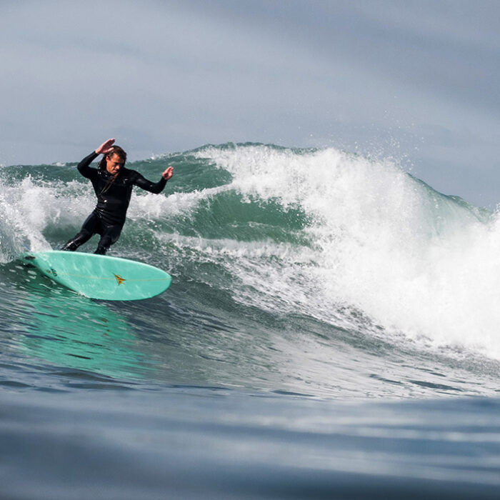 Surfer on Fish Turning