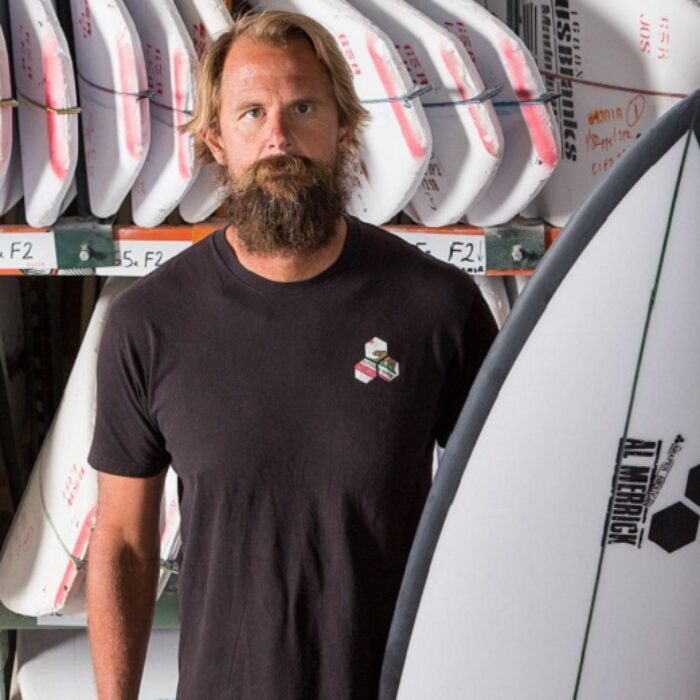 britt merrick with a channel islands surfboard