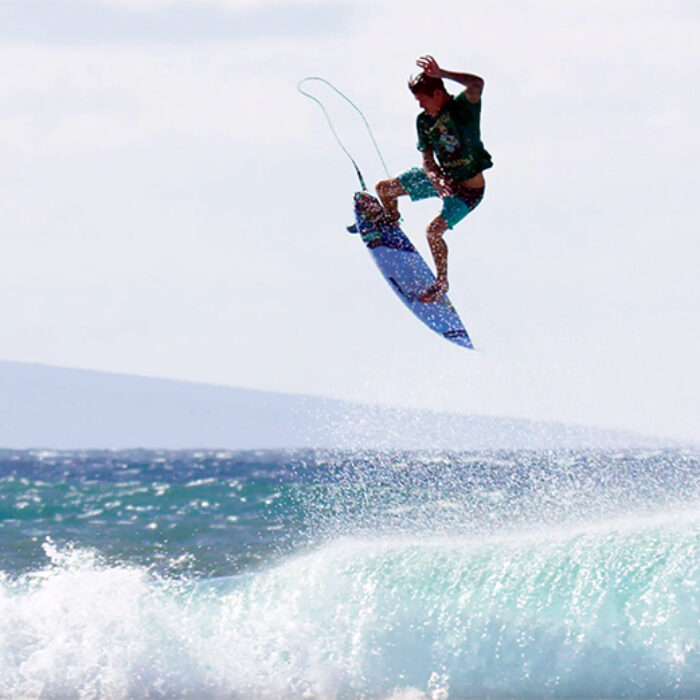 Albee Layer Throws an air off a wave on Maui