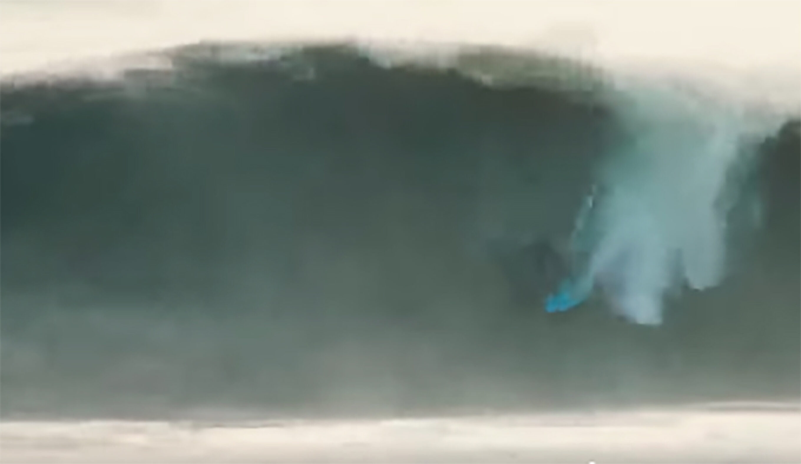 Rob Kelly pulls into a meaty barrel