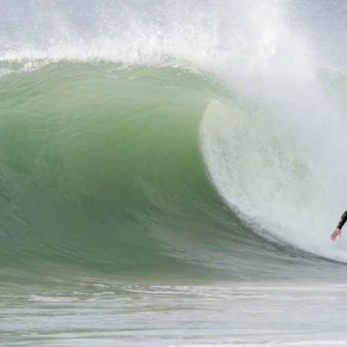 Surfer Ben Gravy sets up to pull into a barrel