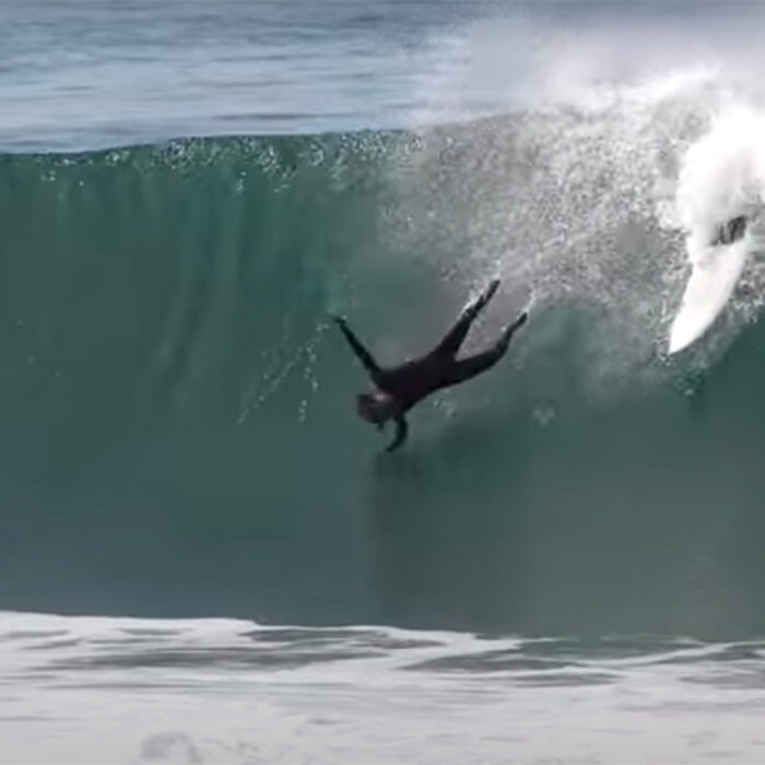 surfer wiping out on a wave