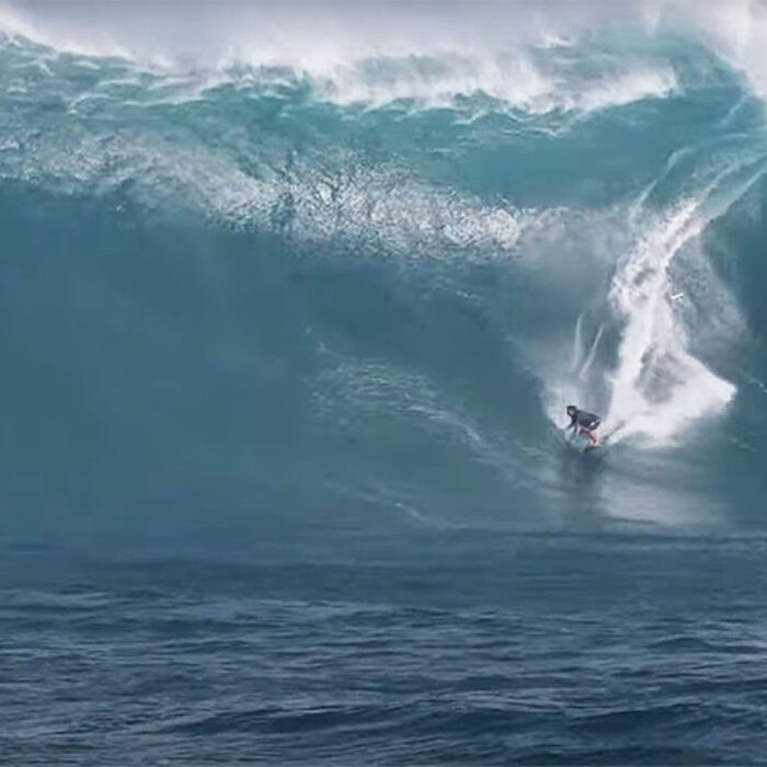 Kai Lenny surfing big wave at Jaws