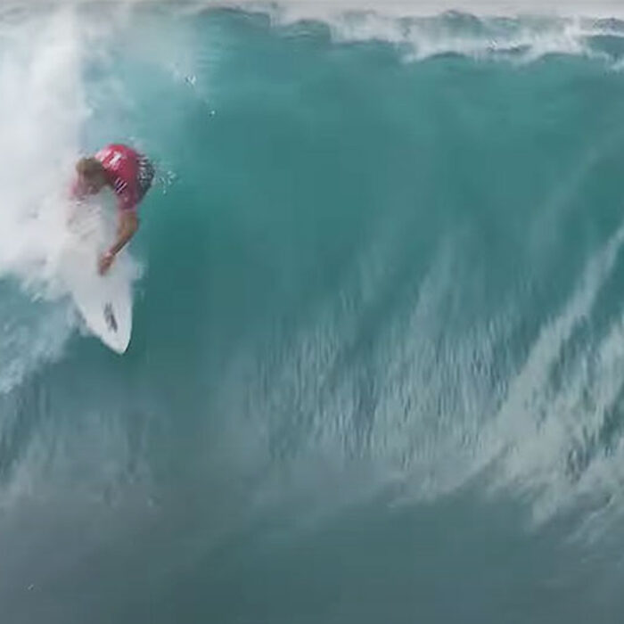 John John Florence surfing wave at Pipeline